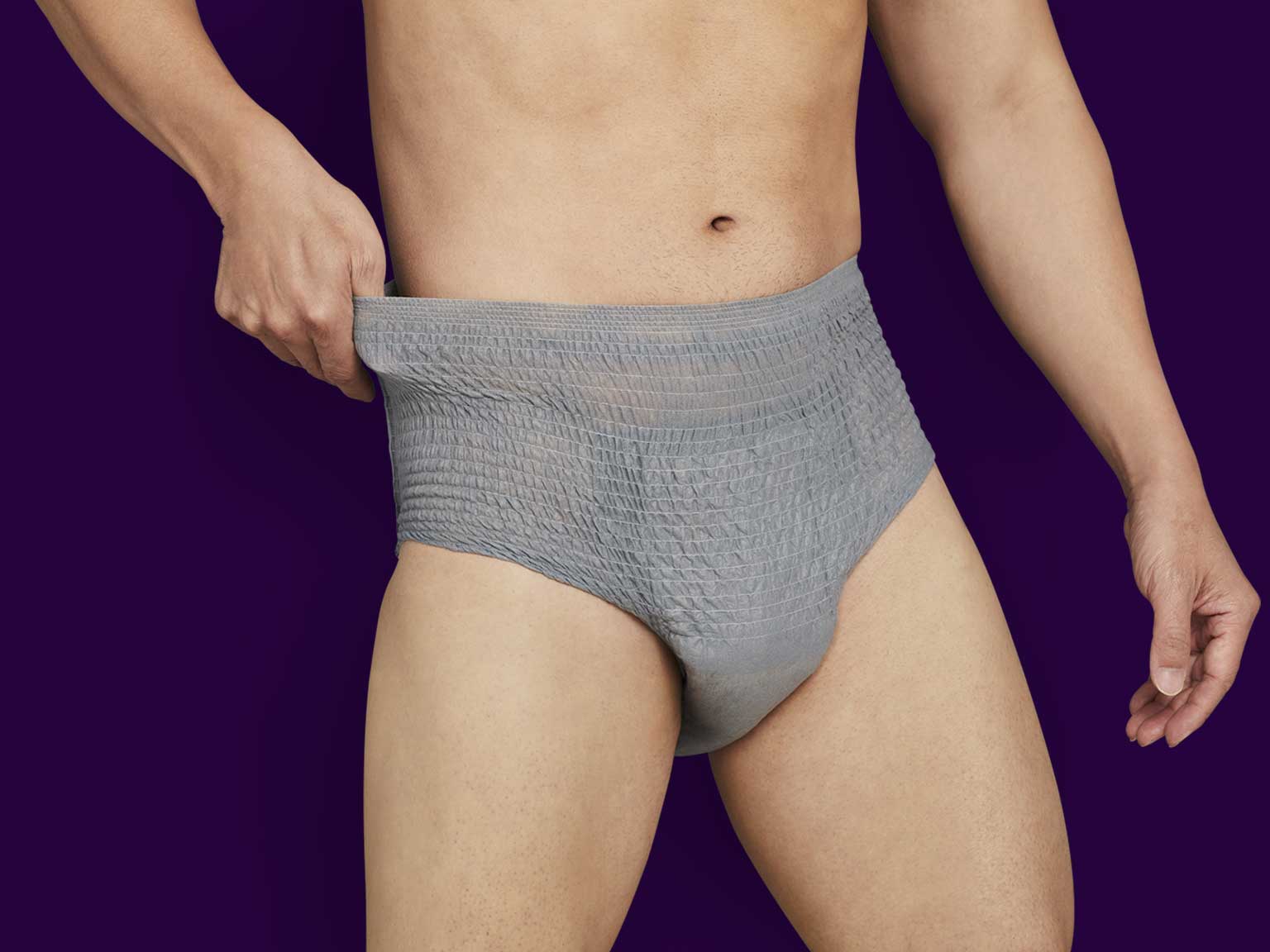Model Wearing Depend® Incontinence Night Defense® Underwear for Men